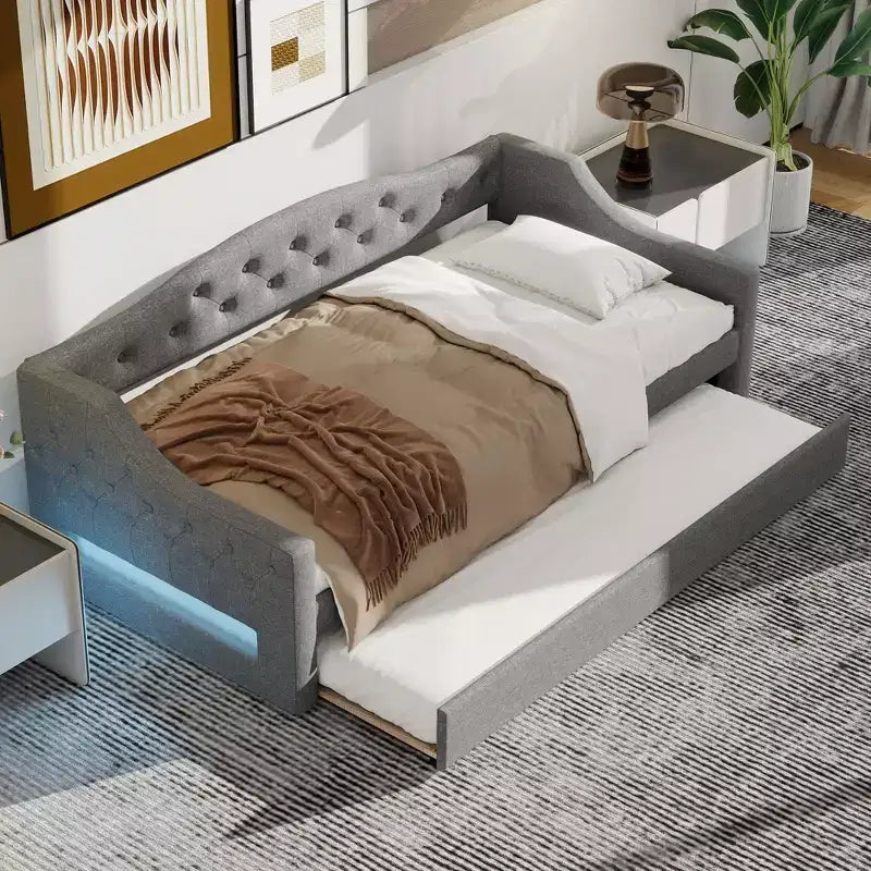 Lit de jour double XL rembourré Whisen avec lit gigogne et éclairage LED