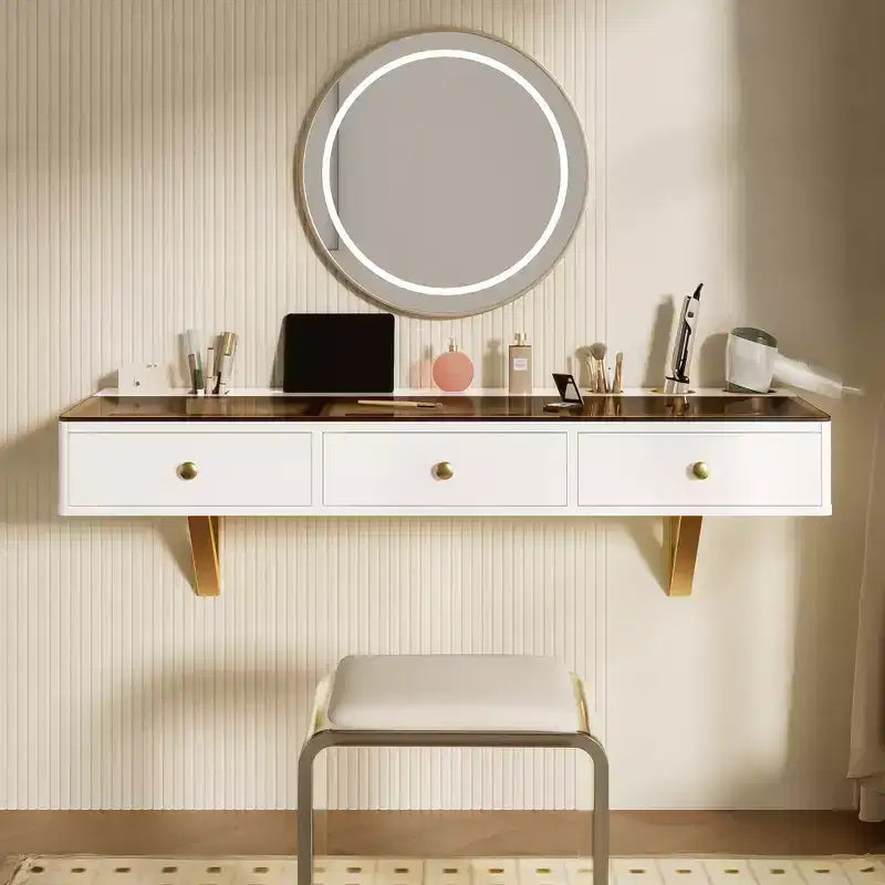 Coiffeuse flottante murale moderne en bois GDFStudio Maria avec 3 tiroirs et finition en verre