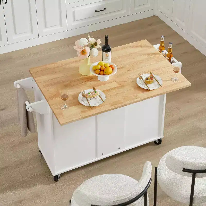 MooxvMoo Îlot de cuisine roulant avec comptoir rabattable, armoire de rangement et porte-serviettes – Chariot mobile sur roues avec porte de grange, Blanc