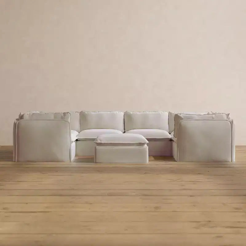 Canapé sectionnel en U Anabei modulaire lavable 6 places + pouf | Assise Deluxe+ et oreiller Cloud