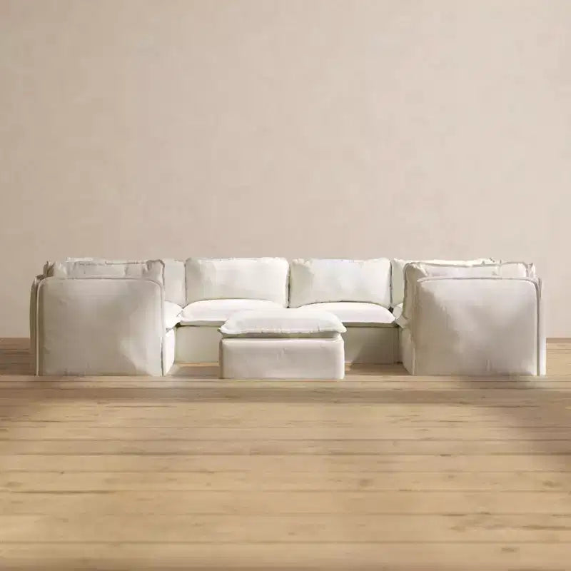 Canapé sectionnel en U Anabei modulaire lavable 6 places + pouf | Assise Deluxe+ et oreiller Cloud