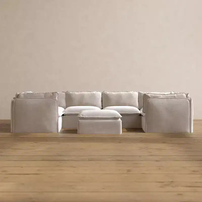 Canapé sectionnel en U Anabei modulaire lavable 6 places + pouf | Assise Deluxe+ et oreiller Cloud