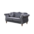 Causeuse Chesterfield cloutée classique