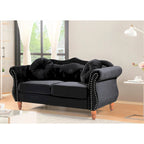 Causeuse Chesterfield cloutée classique