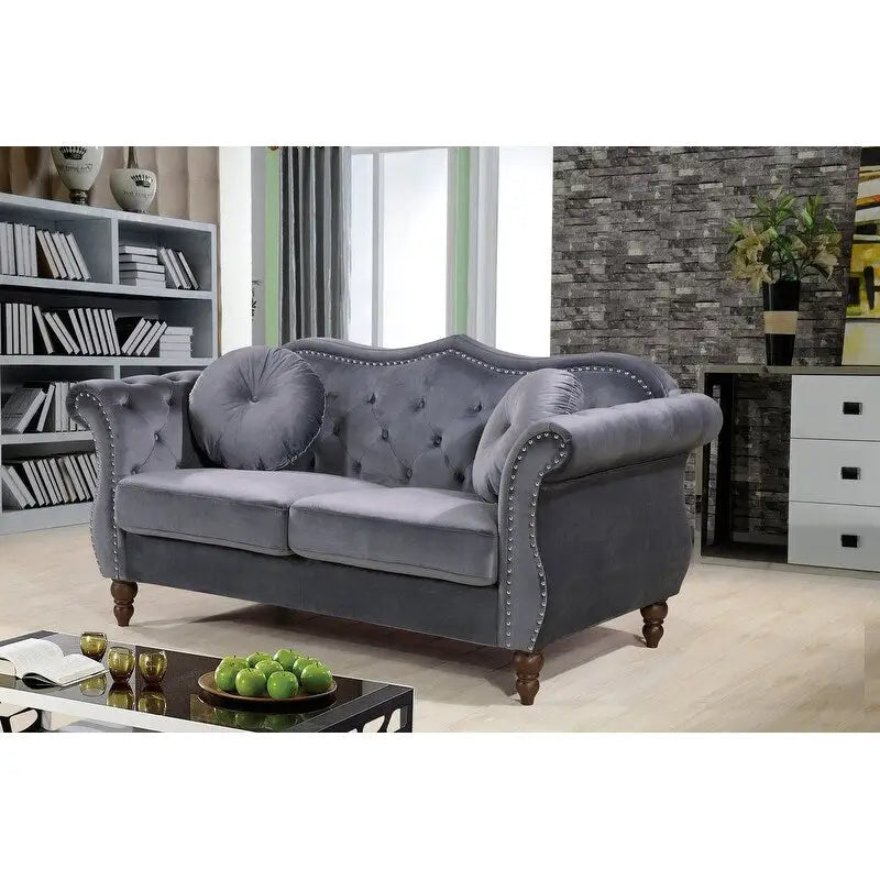 Causeuse Chesterfield cloutée classique