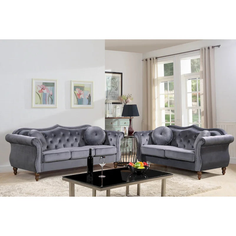 Causeuse Chesterfield cloutée classique